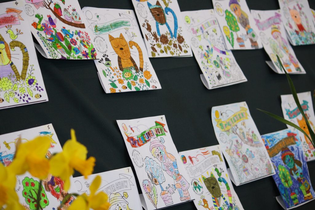 Colouring Competition entries displayed on the wall